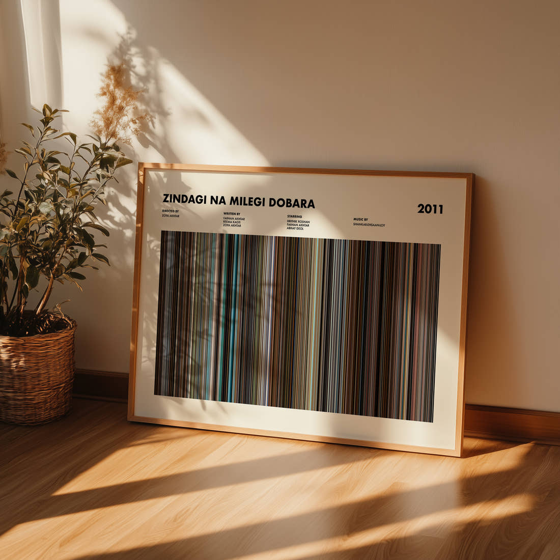 Zindagi Na Milegi Dobara Movie Barcode Poster framed and leaning against a wall on a wooden floor
