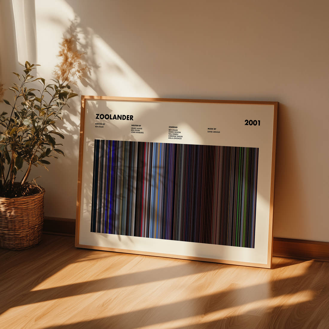 Zoolander Movie Barcode Poster framed and leaning against a wall on a wooden floor